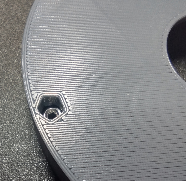 Sample body captive nut installed