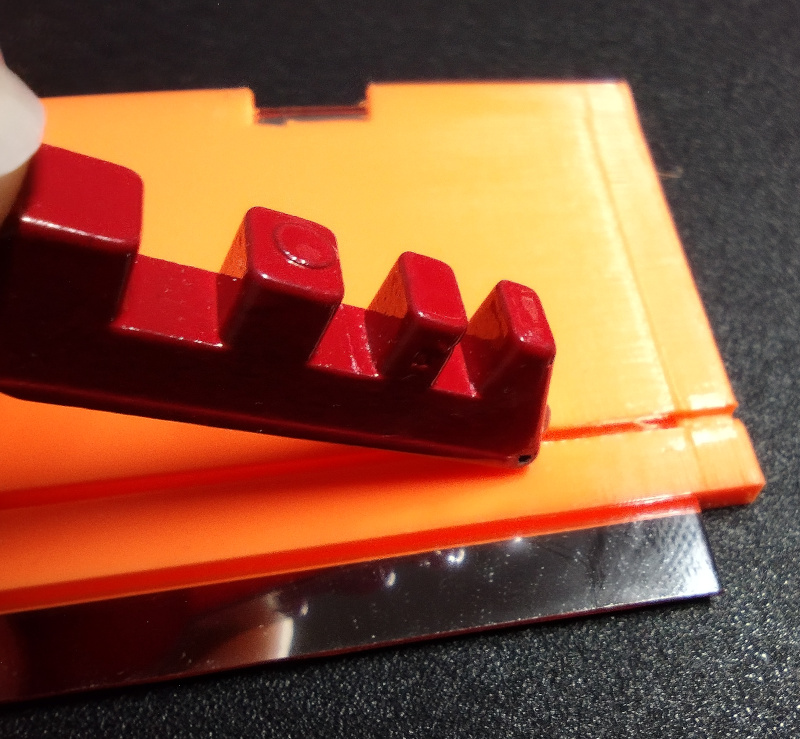 Mirror being scored in jig